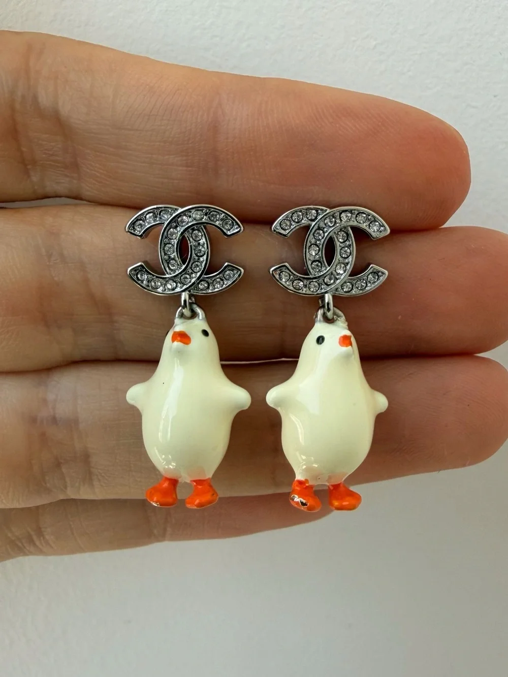 CHANEL White Enamel Chicken CC Drop Earrings with Orange Accents